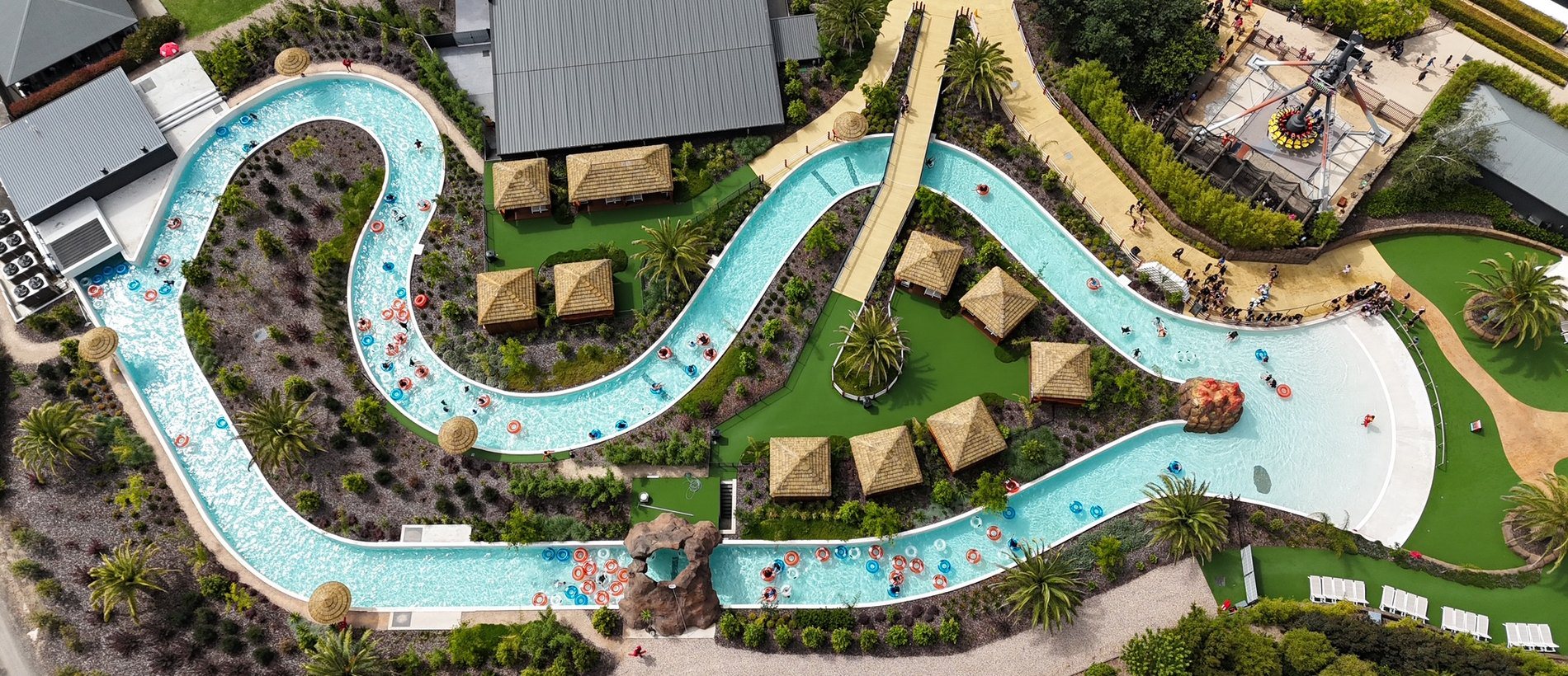 Aerial view of the 280 m lazy river winding through Funfields Theme Park